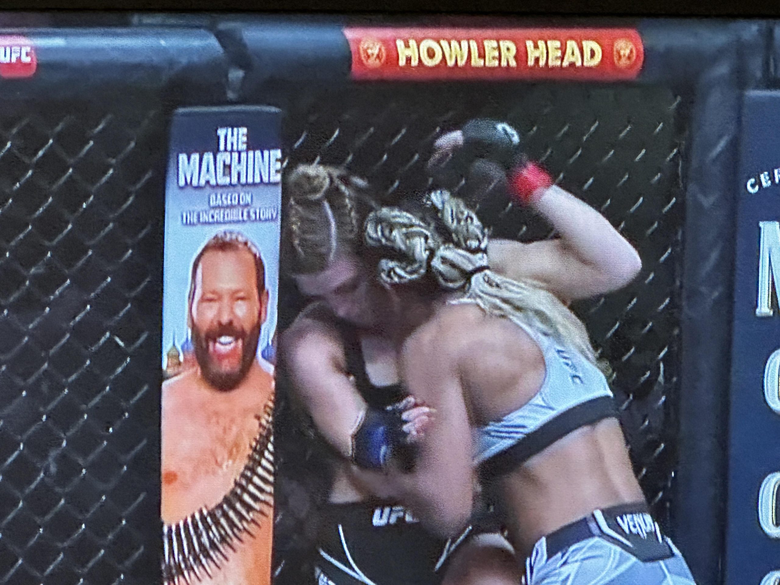 screenshot of UFC broadcast during Mackenzie Dern vs Angela Hill main event